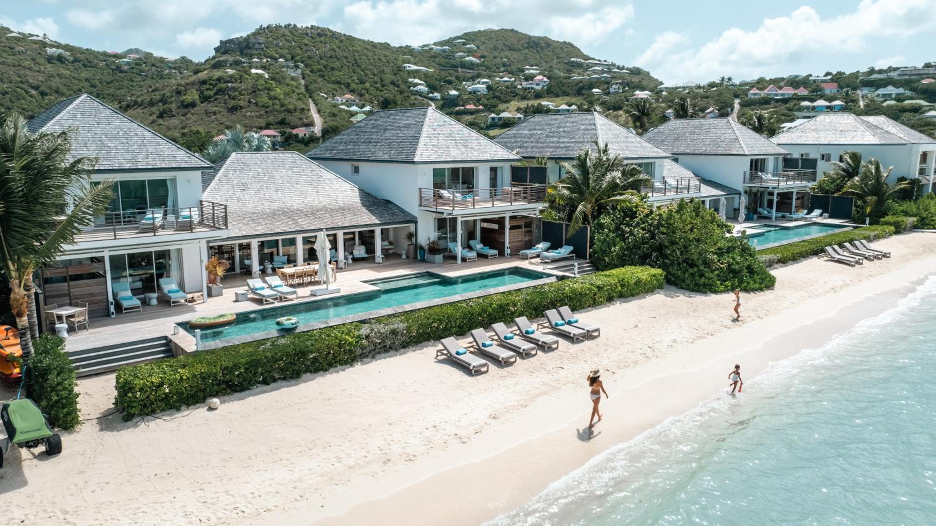 Beachfront suites and palms at Le Barthélemy Hotel & Spa, St. Barts