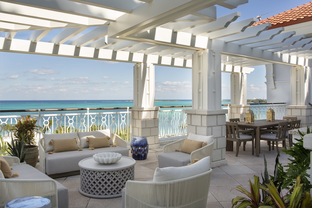 The lagoon pool and palm-lined grounds at Rosewood Baha Mar, Nassau, Bahamas